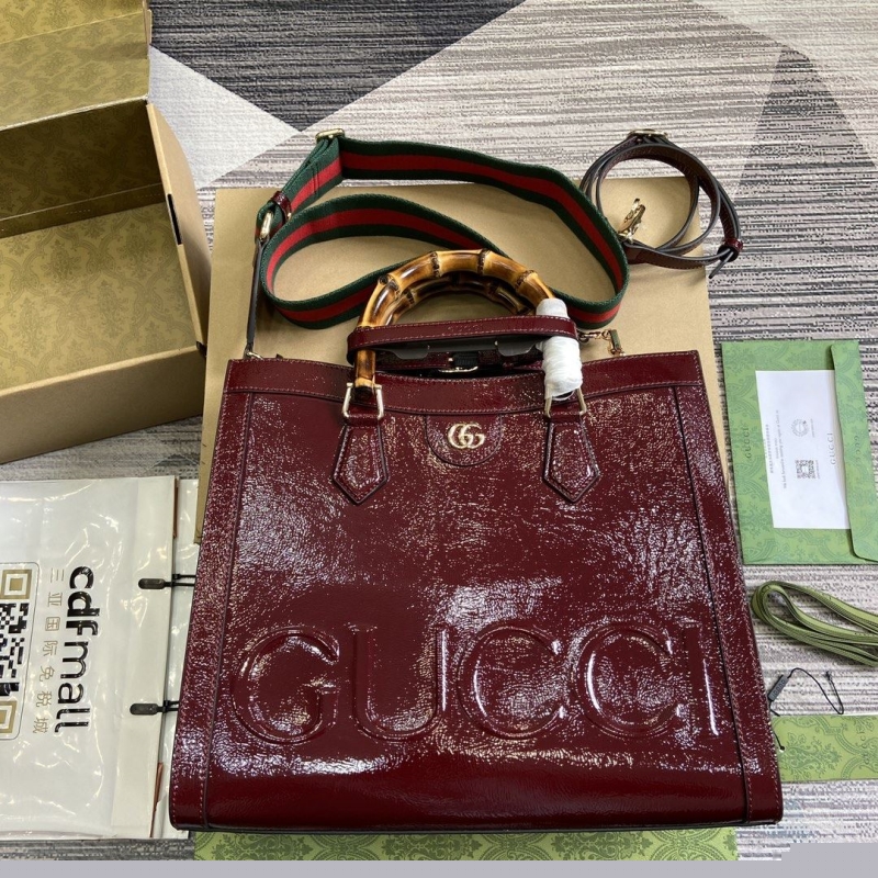 G*u*i top handle bags